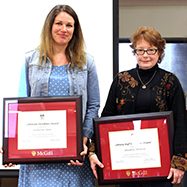 Award winners Katherine Hanz and Elizabeth Thomson holding up their certificates