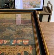 McGill crest detail from Nobbs' Bird's Eye View with scan in the background.