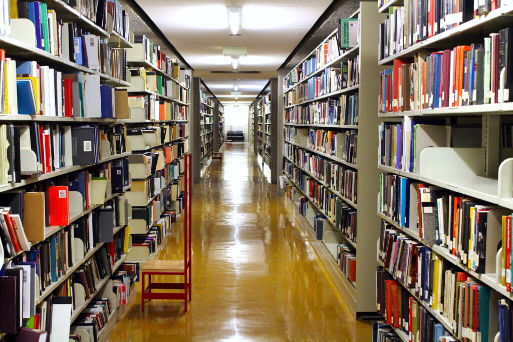 Long view of book stacks in the McLennan Library Building.