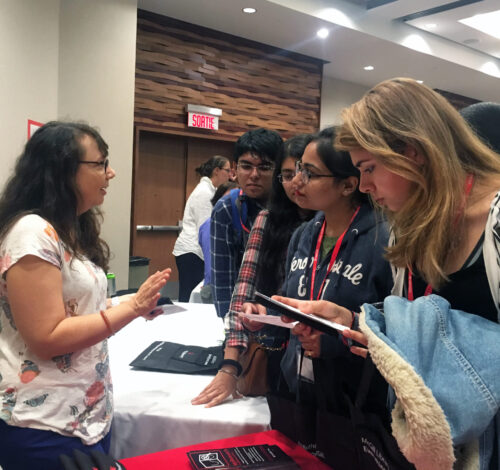 Library table at Discover McGill orientation event for grad students, 2017