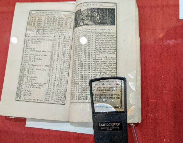 almanac with a magnifying glass