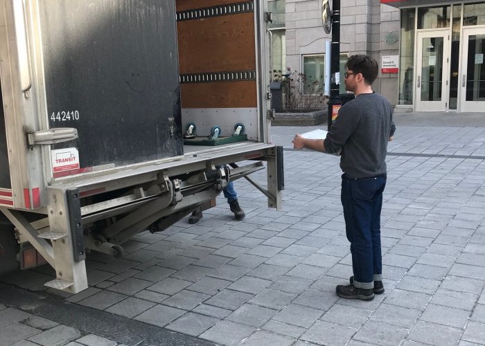 Material bound for the museum is packed into a truck and transported there directly.