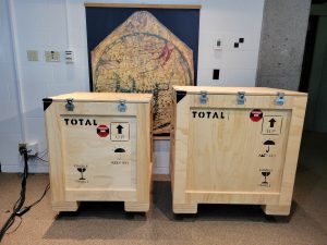 Packed crates in the Colgate Room, ready to move.